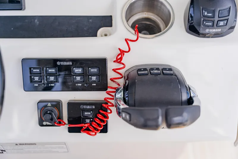  Yacht Photos Pics Control panel of a 2018 Regulator 41 boat featuring Yamaha components.