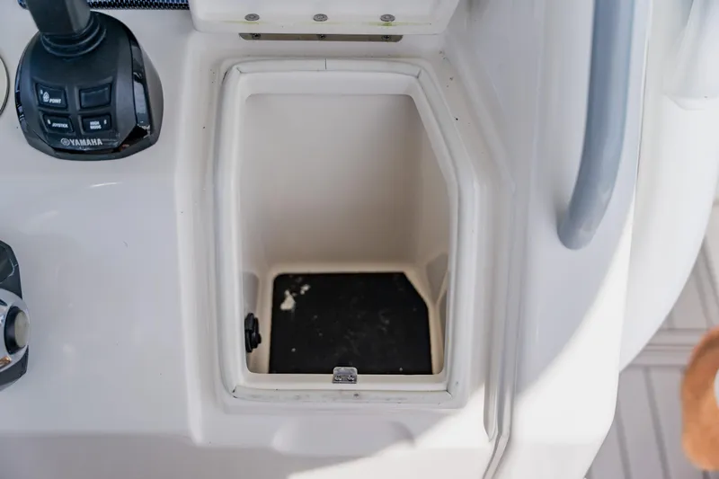  Yacht Photos Pics Open storage compartment on 2018 Regulator 41 boat console with Yamaha controls.