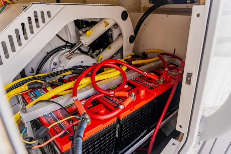  Yacht Photos Pics Battery compartment of a 2018 Regulator 41 boat with red and yellow cables.