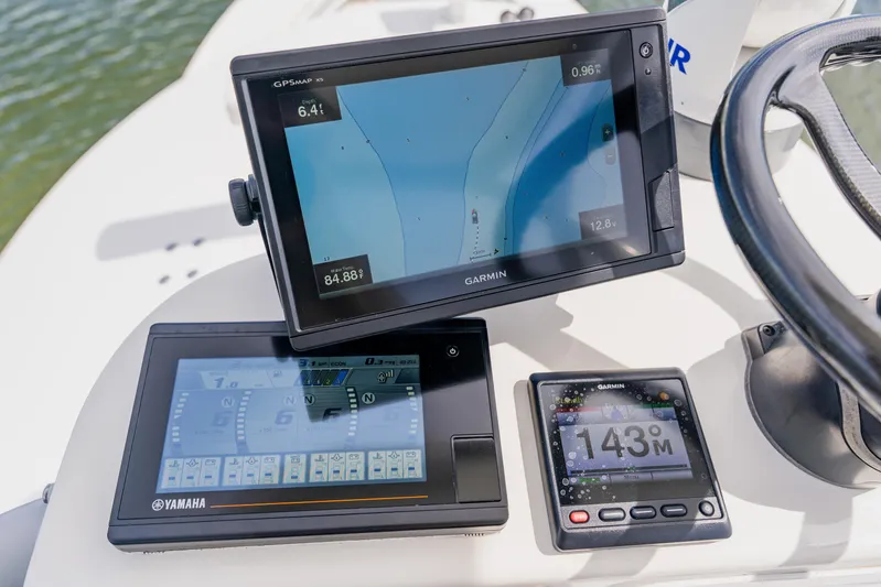  Yacht Photos Pics Boat dashboard with Garmin and Yamaha displays on a 2018 Regulator 41.