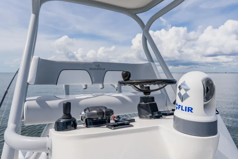  Yacht Photos Pics 2018 Regulator 41 boat helm with FLIR system, ocean view, and clear sky.