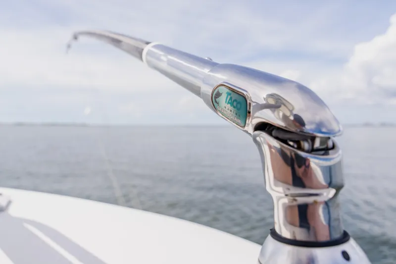  Yacht Photos Pics Close-up of a 2018 Regulator 41 boat's polished metal fitting against a serene ocean backdrop.