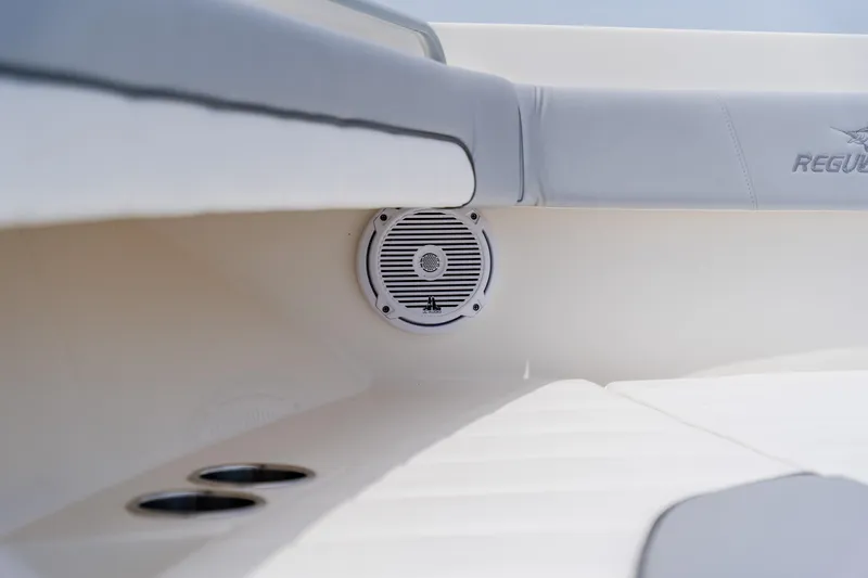  Yacht Photos Pics Interior of 2018 Regulator 41 boat featuring speaker and cushioned seating.