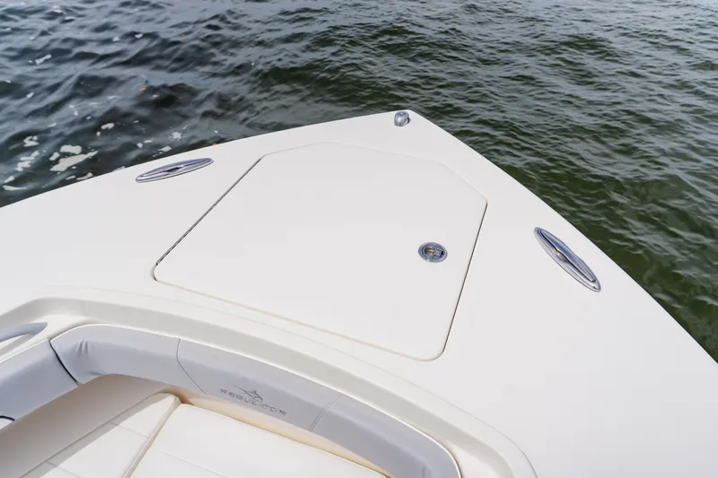  Yacht Photos Pics Bow of 2018 Regulator 41 boat on water, featuring sleek design and storage hatch.