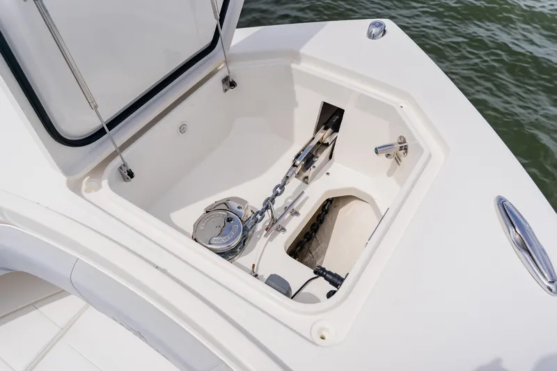 Yacht Photos Pics Anchor compartment of 2018 Regulator 41 boat with visible winch and chain.