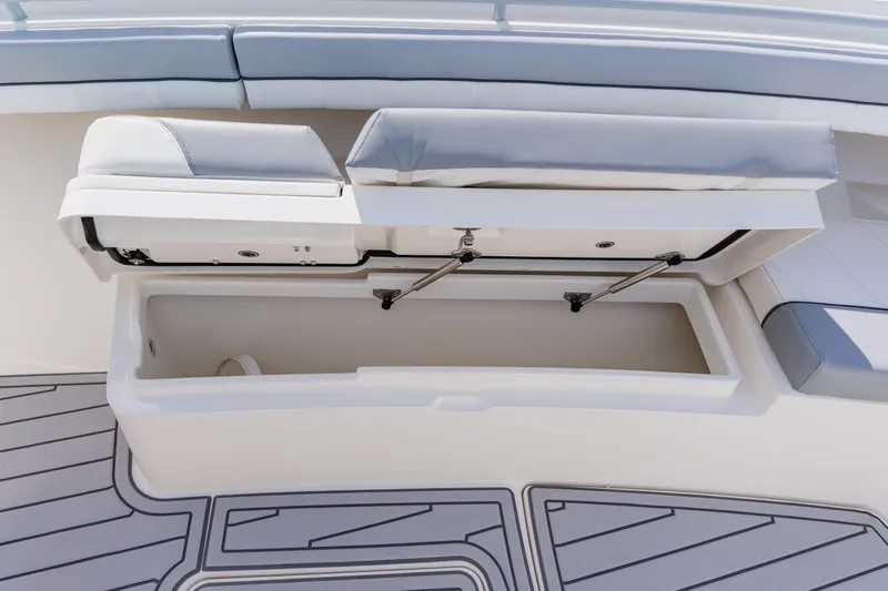 Yacht Photos Pics Open storage compartment on 2018 Regulator 41 boat with cushioned seating.