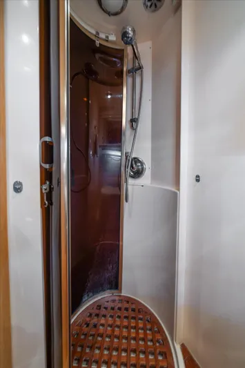  Yacht Photos Pics Shower area in 1996 Johnson High Tech Euro Motoryacht, featuring modern fixtures.