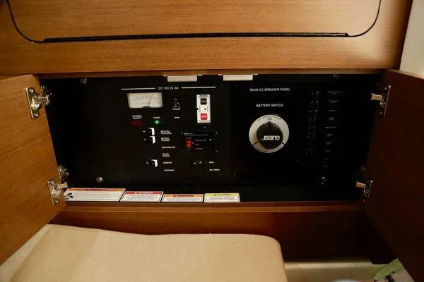 Knot About You Yacht Photos Pics Electrical control panel inside 2017 Sea Ray SLX 350 boat, featuring switches and gauges.