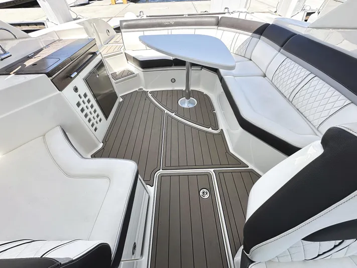 Knot About You Yacht Photos Pics Luxurious 2017 Sea Ray SLX 350 boat interior with elegant seating and modern design.