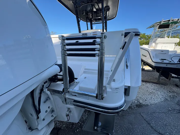  Yacht Photos Pics 2023 Robalo R270 Center Console boat with stainless steel swim ladder.