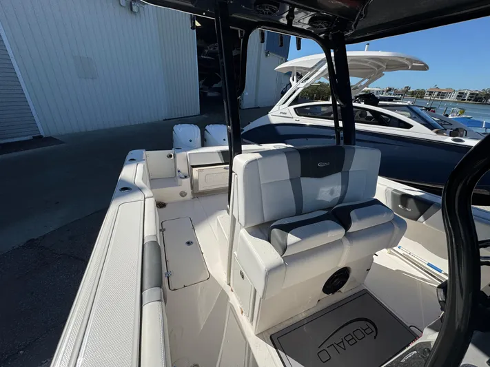  Yacht Photos Pics 2023 Robalo R270 Center Console boat interior with seating and console view.