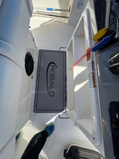  Yacht Photos Pics 2023 Robalo R270 Center Console boat interior with branded flooring and seating.