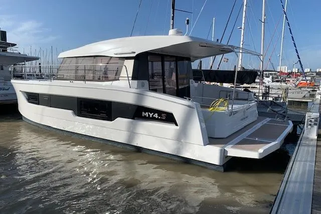 Cat&go Yacht Photos Pics 2025 Fountaine Pajot MY4.S yacht docked at marina, sleek design, modern features.