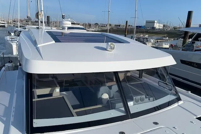 Cat&go Yacht Photos Pics 2025 Fountaine Pajot MY4.S yacht with sleek design docked at marina.