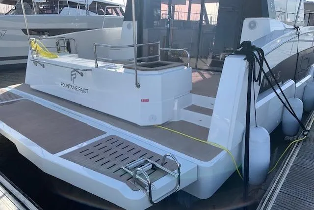 Cat&go Yacht Photos Pics 2025 Fountaine Pajot MY4.S yacht docked, showcasing sleek design and spacious deck.