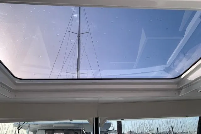 Cat&go Yacht Photos Pics 2025 Fountaine Pajot MY4.S yacht skylight view with clear blue sky.