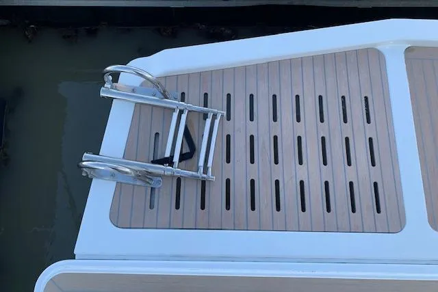 Cat&go Yacht Photos Pics 2025 Fountaine Pajot MY4.S yacht swim platform with ladder and teak decking.