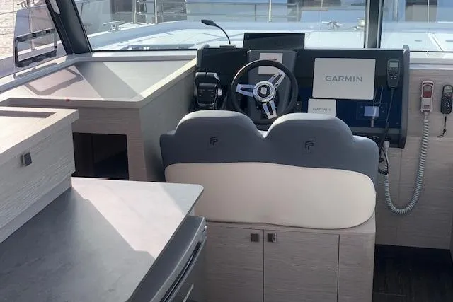 Cat&go Yacht Photos Pics 2025 Fountaine Pajot MY4.S yacht helm with Garmin navigation system and modern controls.
