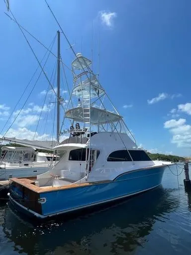 Barratuna Yacht Photos Pics 2008 Custom Carolina 53 Sculley yacht docked under a clear blue sky.