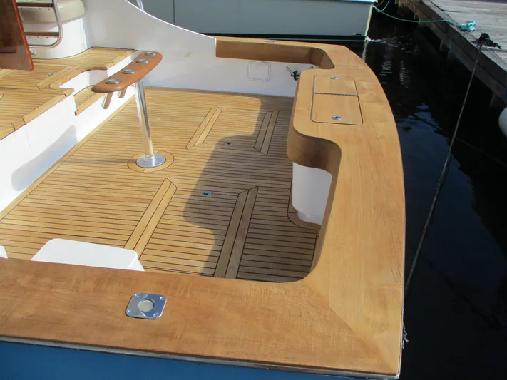 Barratuna Yacht Photos Pics 2008 Custom Carolina 53 Sculley boat deck with teak flooring and seating area.
