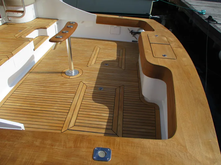 Barratuna Yacht Photos Pics 2008 Custom Carolina 53 Sculley teak deck with rod holders and storage compartments.