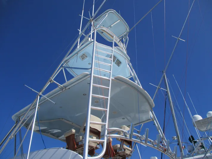 Barratuna Yacht Photos Pics 2008 Custom Carolina 53 Sculley yacht tower and ladder against blue sky.