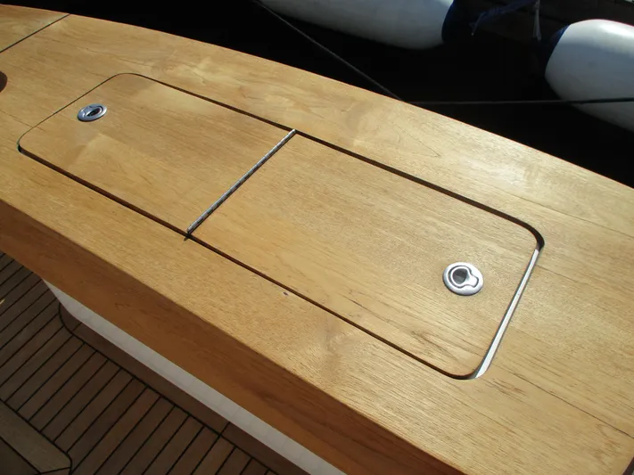 Barratuna Yacht Photos Pics Wooden deck hatch on a 2008 Custom Carolina 53 Sculley boat.