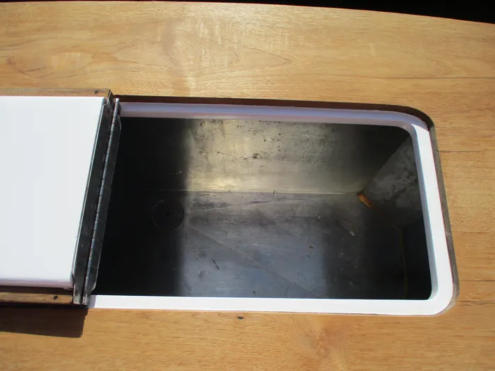 Barratuna Yacht Photos Pics Open storage compartment on 2008 Custom Carolina 53 Sculley boat.