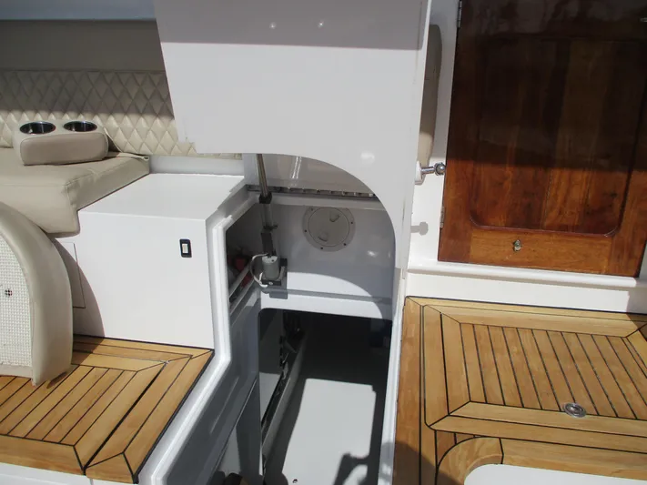 Barratuna Yacht Photos Pics 2008 Custom Carolina 53 Sculley boat interior with open hatch and wooden accents.