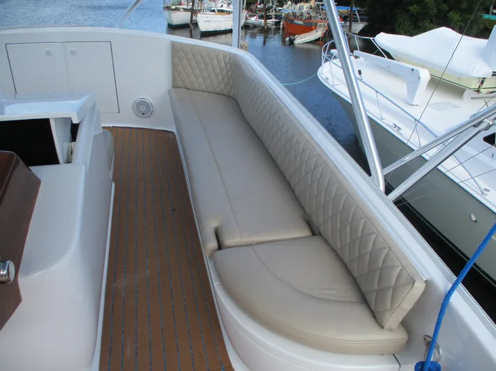 Barratuna Yacht Photos Pics Custom Carolina 53 Sculley 2008 boat with cushioned seating and teak deck.