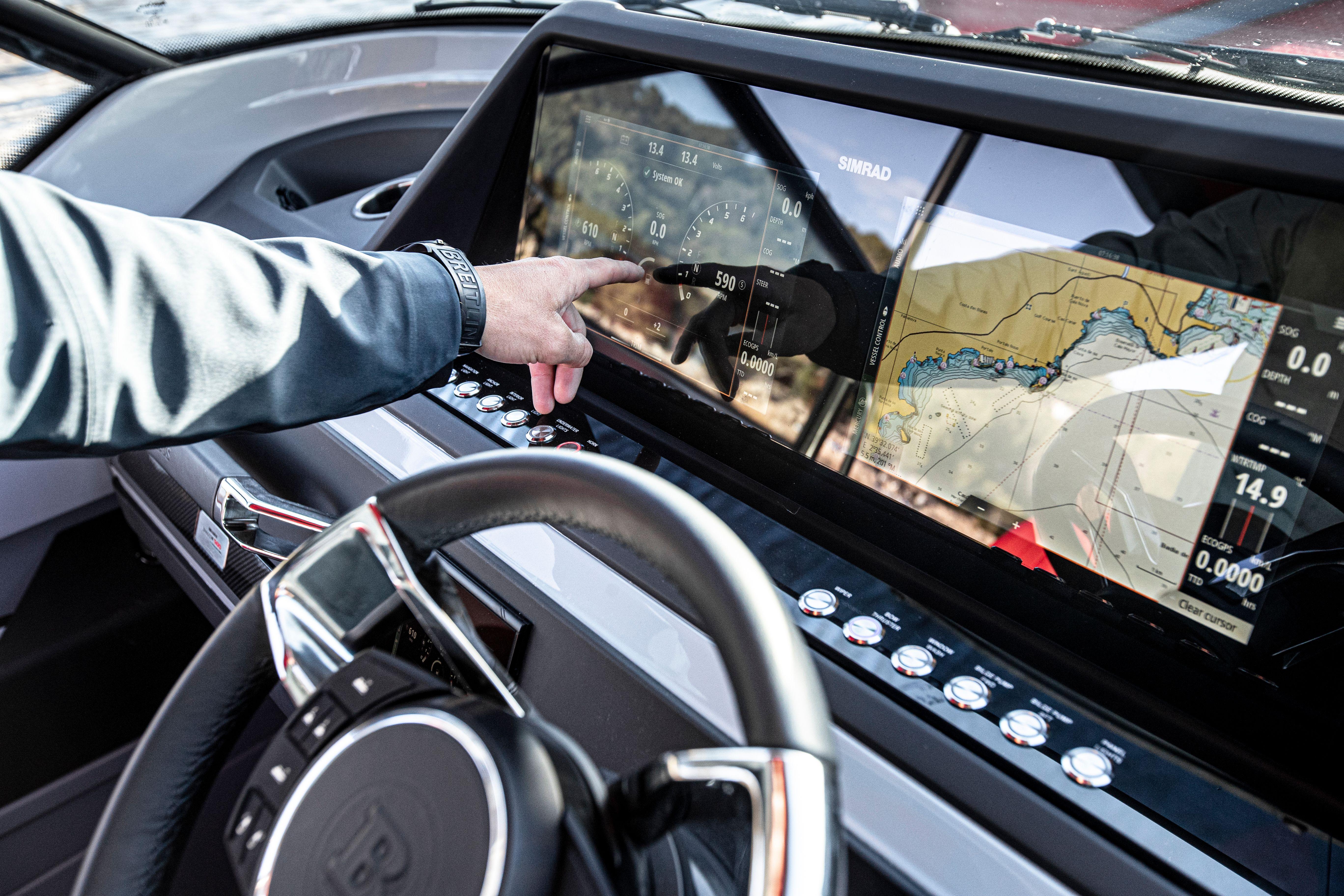 BRABUS Shadow 500 T-Top AFT Cabin 2023 dashboard with touchscreen navigation system.