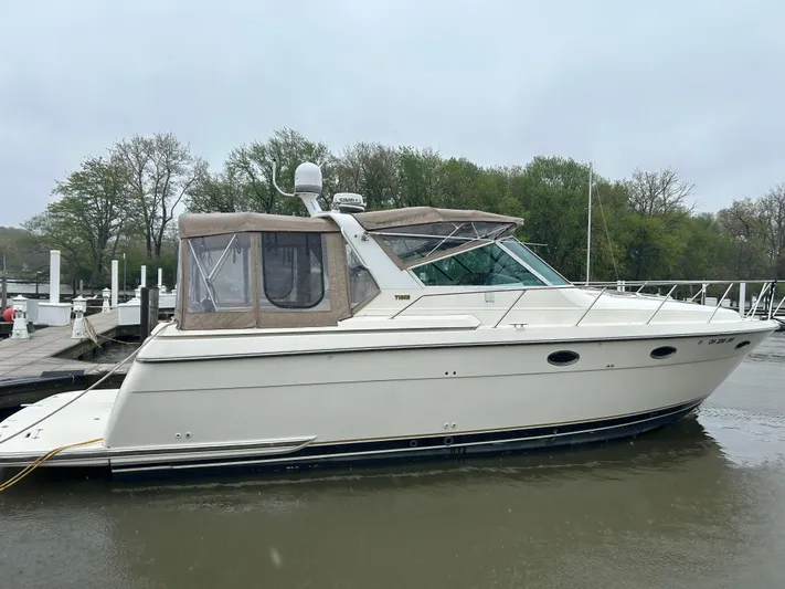 Matilda Bay Yacht Photos Pics 1997 Tiara Yachts 3500 Express docked on a calm, overcast day.