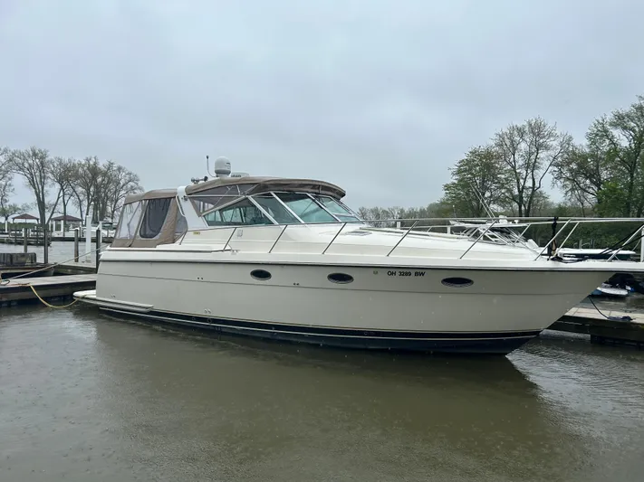 Matilda Bay Yacht Photos Pics 1997 Tiara Yachts 3500 Express docked on a cloudy day.