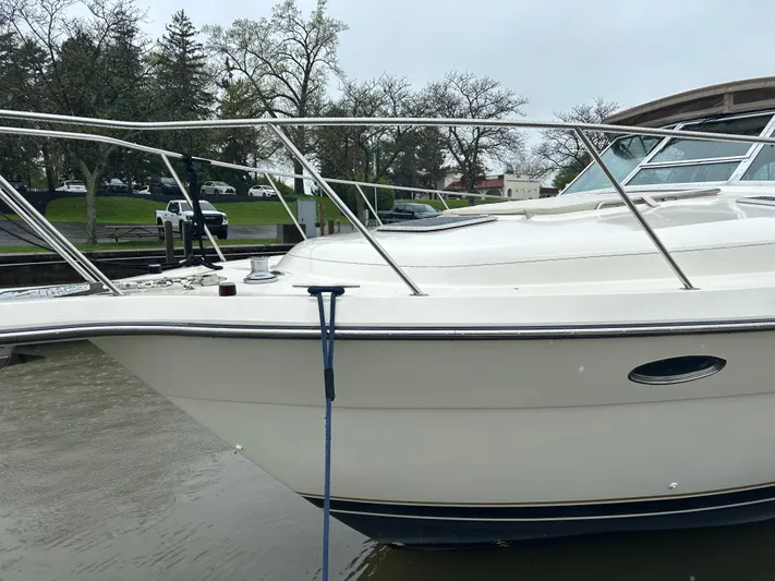 Matilda Bay Yacht Photos Pics 1997 Tiara Yachts 3500 Express docked, showcasing sleek design and sturdy railings.