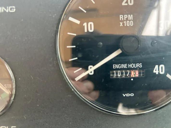 Matilda Bay Yacht Photos Pics Close-up of Tiara Yachts 3500 Express 1997 engine hour meter showing 1017 hours.