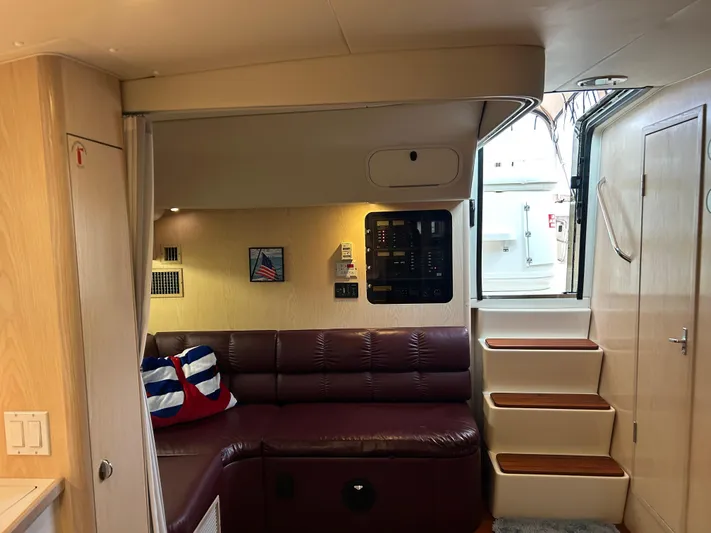Matilda Bay Yacht Photos Pics Interior of 1997 Tiara Yachts 3500 Express with leather seating and wooden steps.