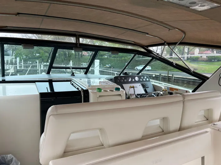 Matilda Bay Yacht Photos Pics 1997 Tiara Yachts 3500 Express interior with helm and seating area.