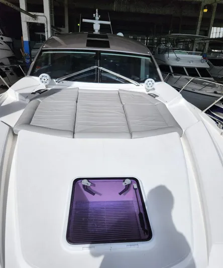  Yacht Photos Pics 2018 Sunseeker Predator yacht with sunbathing area and hatch.