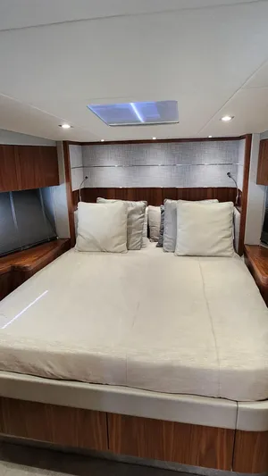  Yacht Photos Pics Luxurious bedroom interior of a 2018 Sunseeker Predator yacht.