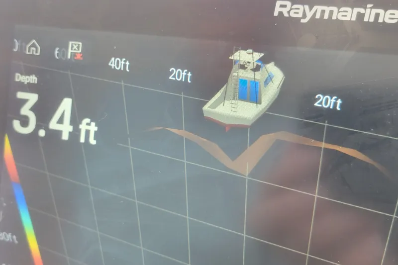 Escape II Sea Yacht Photos Pics Raymarine depth display showing 3.4 feet for 2003 Silverton 453 Motor Yacht.