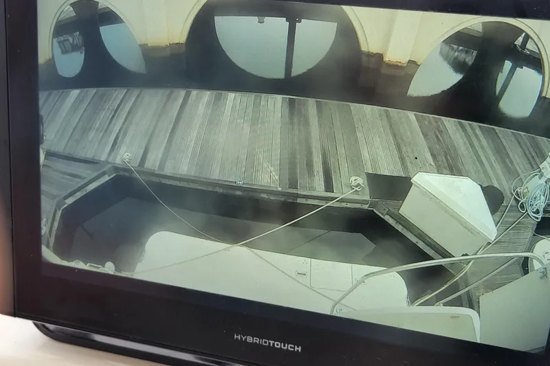 Escape II Sea Yacht Photos Pics 2003 Silverton 453 Motor Yacht docked, viewed from onboard camera display.