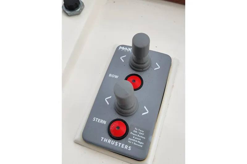 Escape II Sea Yacht Photos Pics Control panel for bow and stern thrusters on a 2003 Silverton 453 Motor Yacht.