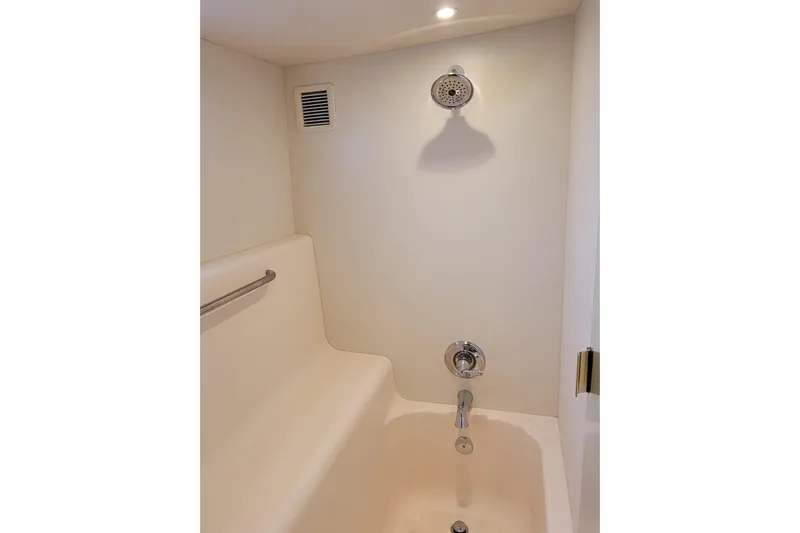 Escape II Sea Yacht Photos Pics Shower area in 2003 Silverton 453 Motor Yacht, featuring a sleek, minimalist design.