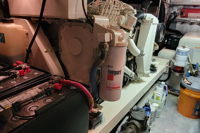 Escape II Sea Yacht Photos Pics Engine room of a 2003 Silverton 453 Motor Yacht with batteries and filters.
