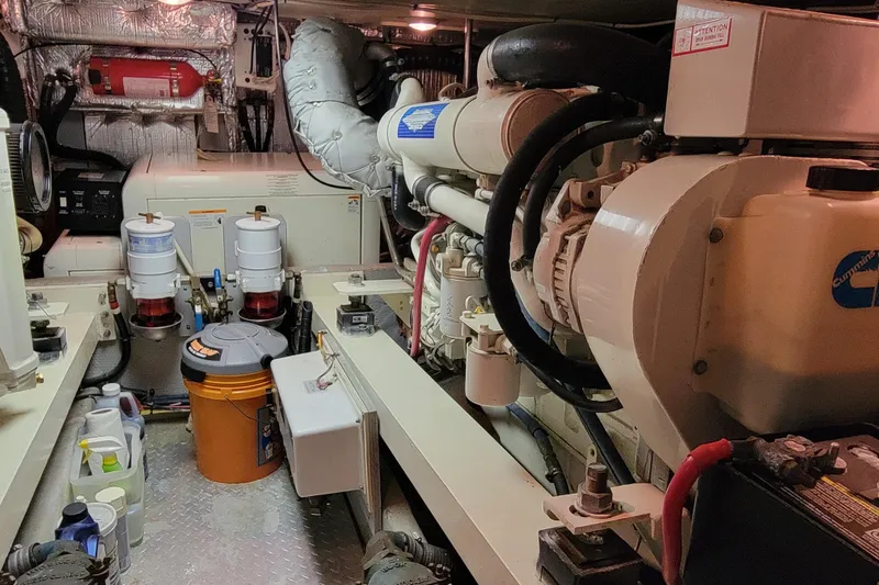 Escape II Sea Yacht Photos Pics Engine room of a 2003 Silverton 453 Motor Yacht, showcasing machinery and equipment.