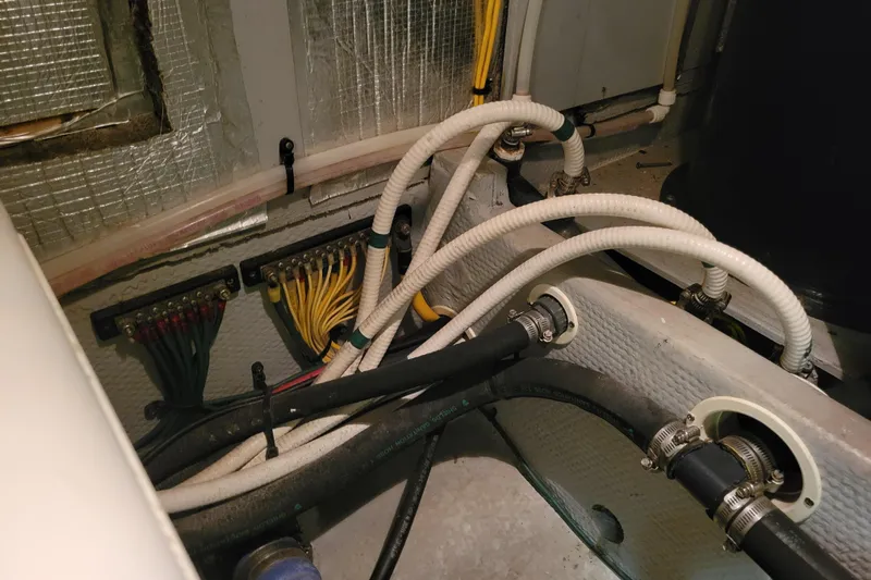 Escape II Sea Yacht Photos Pics Engine room wiring and hoses in a 2003 Silverton 453 Motor Yacht.