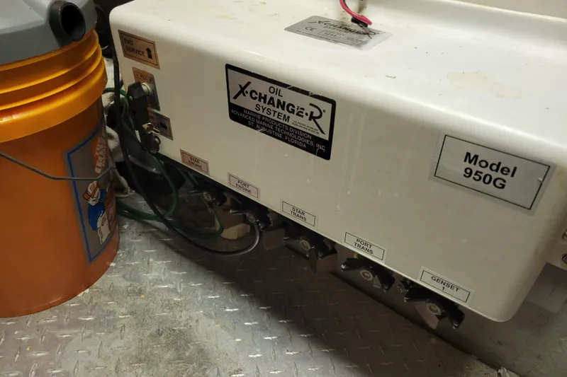 Escape II Sea Yacht Photos Pics Oil X-Change-R System Model 950G in 2003 Silverton 453 Motor Yacht engine room.