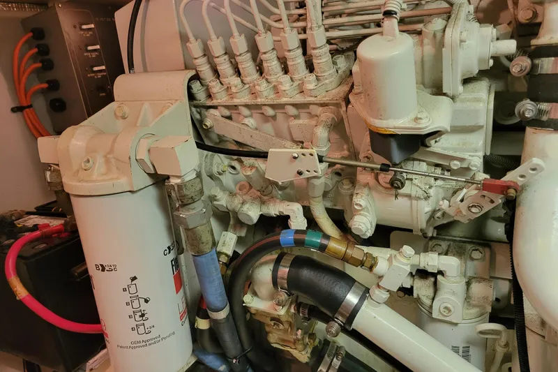 Escape II Sea Yacht Photos Pics Engine compartment of a 2003 Silverton 453 Motor Yacht, showcasing detailed mechanical components.