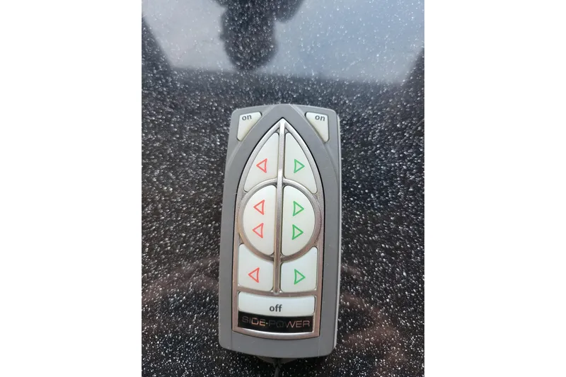 Escape II Sea Yacht Photos Pics Remote control for 2003 Silverton 453 Motor Yacht, featuring directional buttons.
