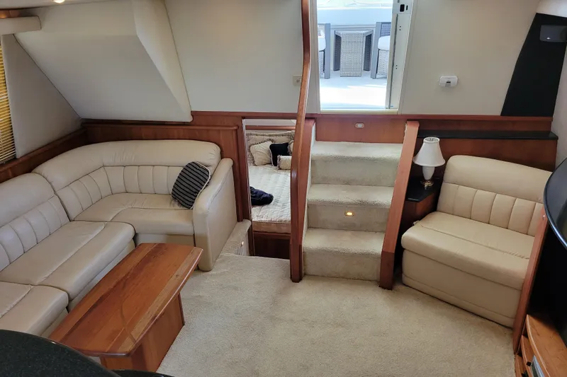 Escape II Sea Yacht Photos Pics Luxurious interior of 2003 Silverton 453 Motor Yacht with plush seating and elegant decor.